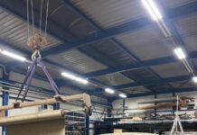 Considering Fiber-Reinforced Composites for Sheathing Greenboats laying flax fabric to construct the MB9 monohull, which is entirely constructed from Natural Fibre Composites (NFCs). Photo courtesy of Greenboats.