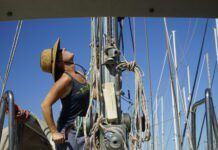 Hauling Jamie up the mast. Sailing Totem's Behan Gifford says she’s a much happier human being when on a boat.