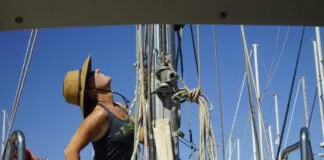 Hauling Jamie up the mast. Sailing Totem's Behan Gifford says she’s a much happier human being when on a boat.