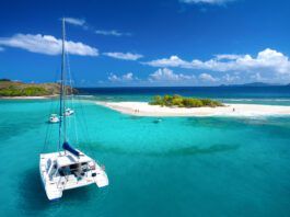 Charter Boat Ownership Programs Explained: A Simple Financial Overview If you frequently charter, then a "charter to ownership" model may appeal to you. A catamaran at Sandy Spit, British Virgin Islands, Caribbean. (Photo/ cdwheatley/ Getty)