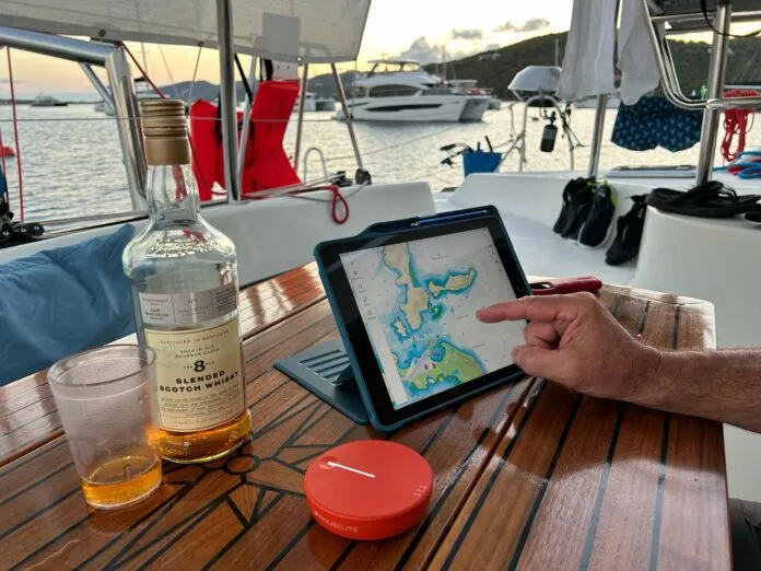 Using the Solis Lite mobile hotspot in the BVIs to access secure Wi-Fi. (Photo/ Marc Robic)