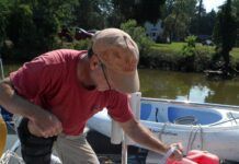 Testing the shaker siphon. The most spill-proof, low-strain way to transfer fuel from a jerry can to the tank. Yes, there are motorized versions and versions with a pump-bulb, but all these do is make it more complicated. (Photo/ Drew Frye)
