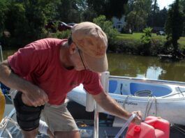 Testing the shaker siphon. The most spill-proof, low-strain way to transfer fuel from a jerry can to the tank. Yes, there are motorized versions and versions with a pump-bulb, but all these do is make it more complicated. (Photo/ Drew Frye)