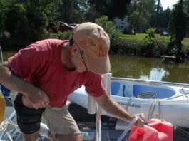 Testing the shaker siphon. The most spill-proof, low-strain way to transfer fuel from a jerry can to the tank. Yes, there are motorized versions and versions with a pump-bulb, but all these do is make it more complicated. (Photo/ Drew Frye)