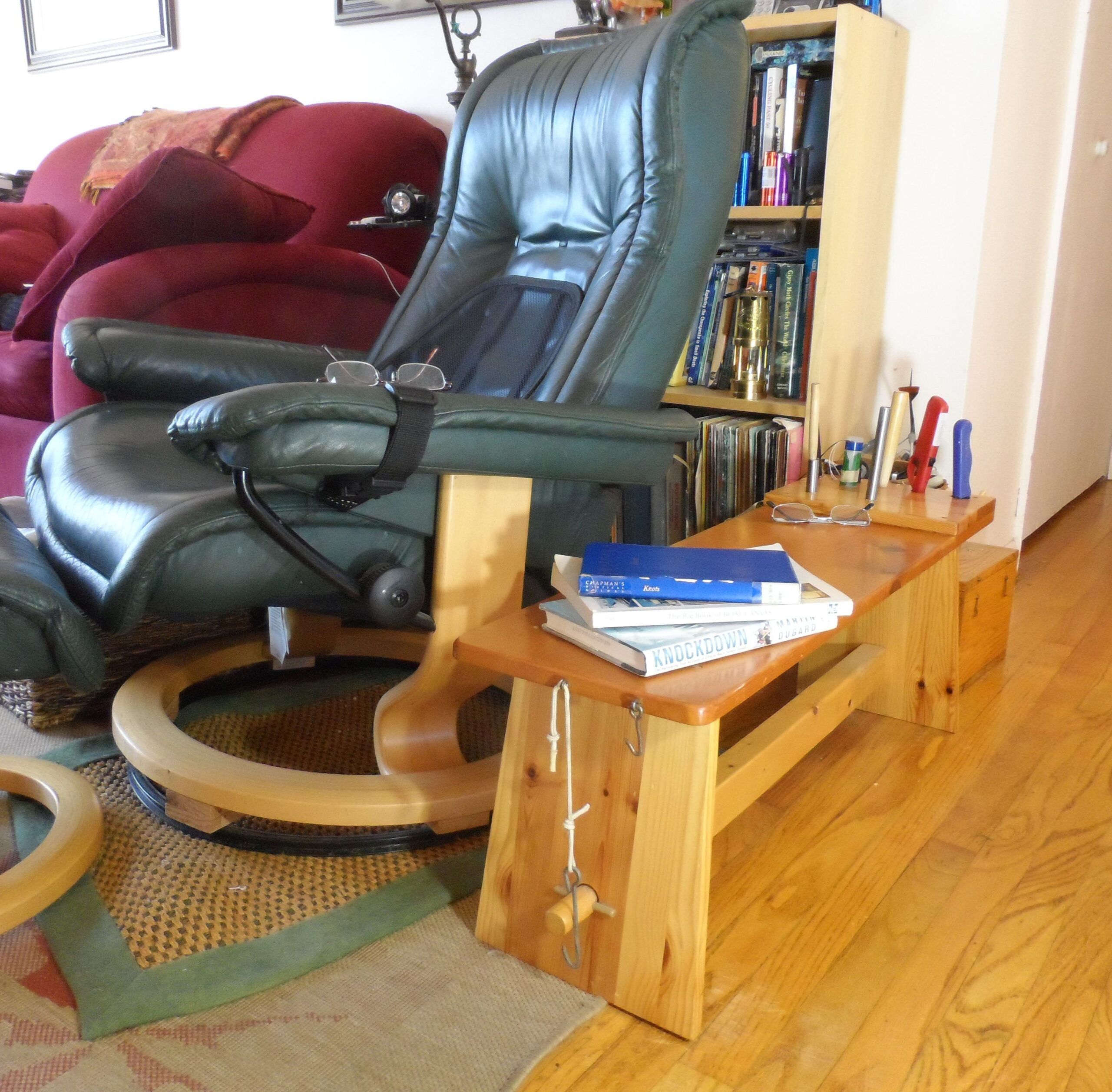 On wet weather days, you can do sail repairs indoors with the finisher's bench handy. (Photo/ Drew Frye)