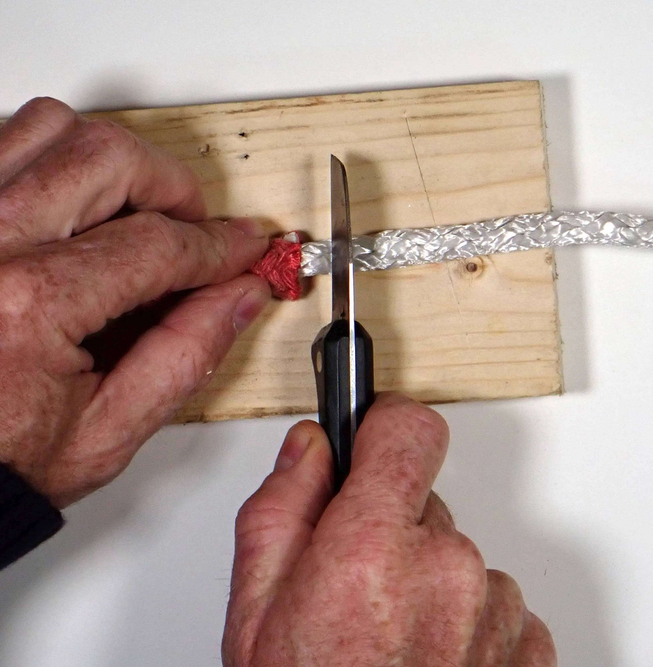 For making reeving eyes in polyester doublebraid, pull out the core and trim. Taper slightly by cutting at an angle if you are doing the spliced version. (Photo/ Drew Frye)