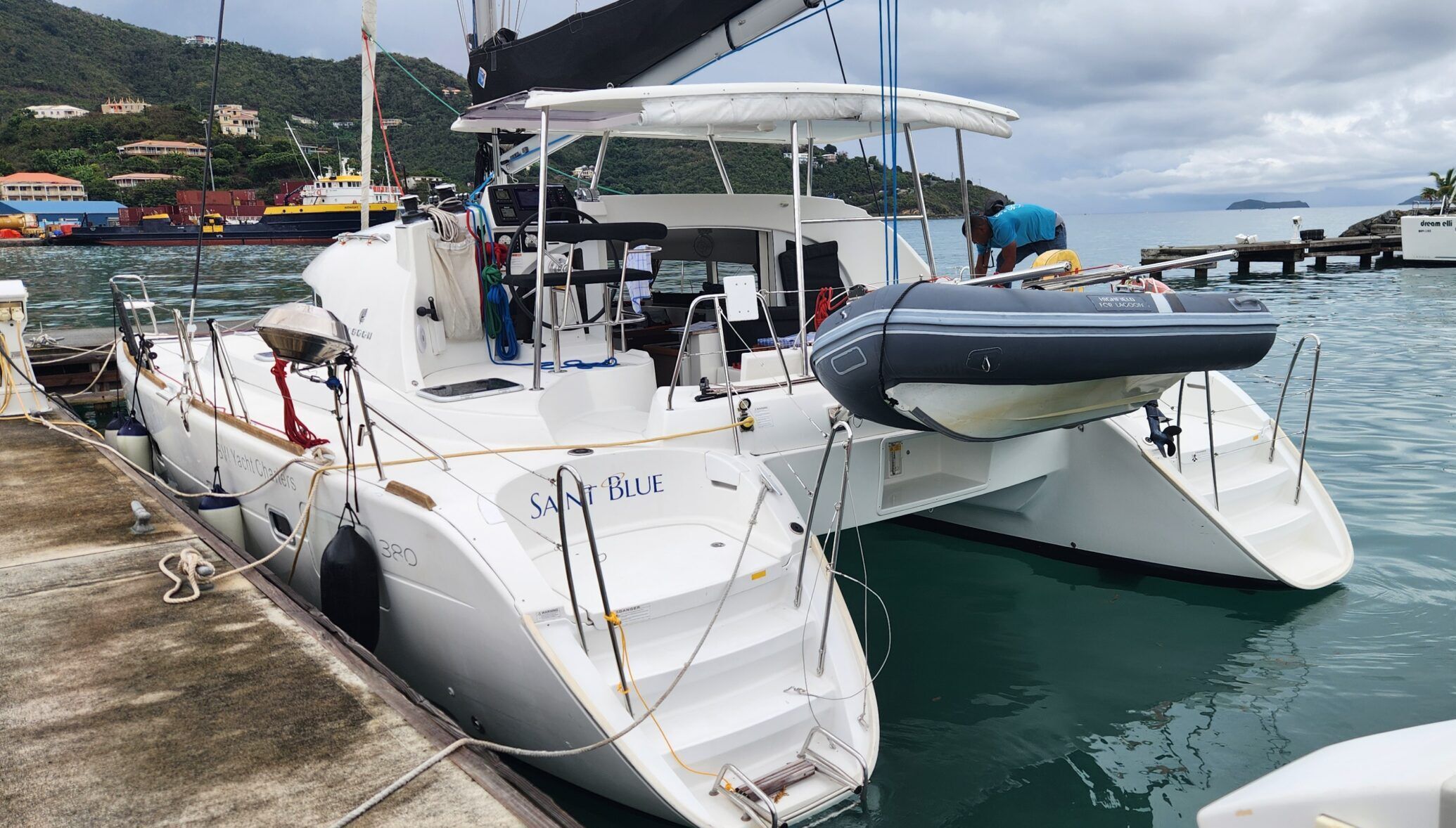 Built-in davitz on the stern allow for easy dinghy lowering and raising. In bumpier conditions, make sure someone is holding the dinghy painter line so the outboard doesn't crash into the opposite hull. (Photo/ Marc Robic)