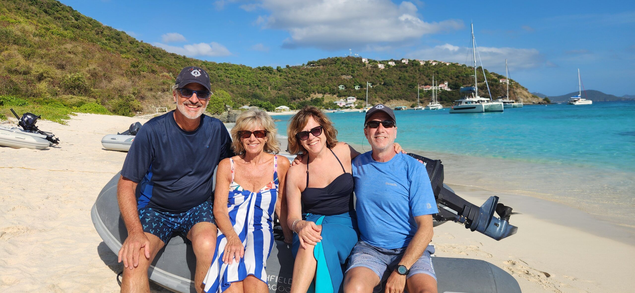 Beaching our dinghy on White Bay, Jost Van Dyke. From left to right, Marc Robic (writer), his wife, Claude Couture, Laura Del Grande and her husband David Newell. (Photo/ Marc Robic)