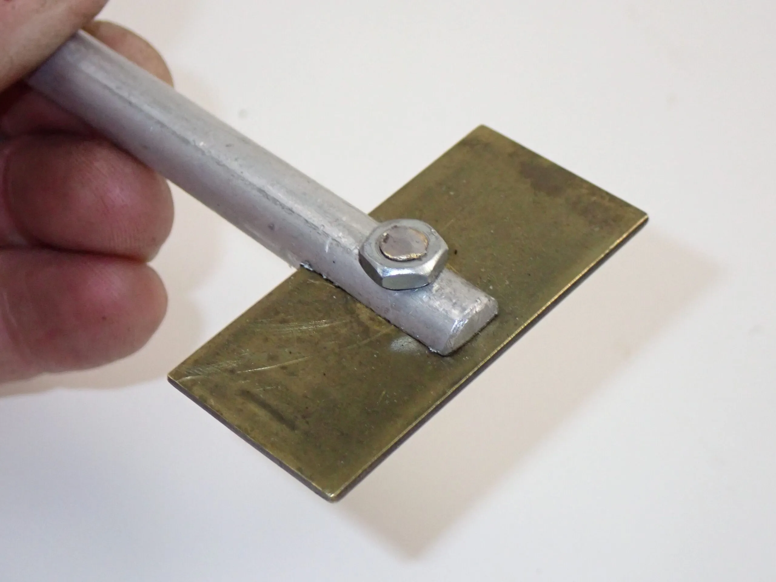 Paint mixer. Faster at suspending the heavy copper that settles out of bottom paint. Easier to clean. We have not used anything else since we discovered these 30 years ago. Easily made from a 3/8-inch rod and a scrap of about 1/16-inch metal. We even made small ones for small jars. (Photo/ Drew Frye)