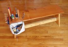 This finishing bench is a rough copy of one I saw in a sailmaker’s workshop. It is both a piece of furniture and an efficient tool for periodic sail maintenance. (Photo/ Drew Frye)
