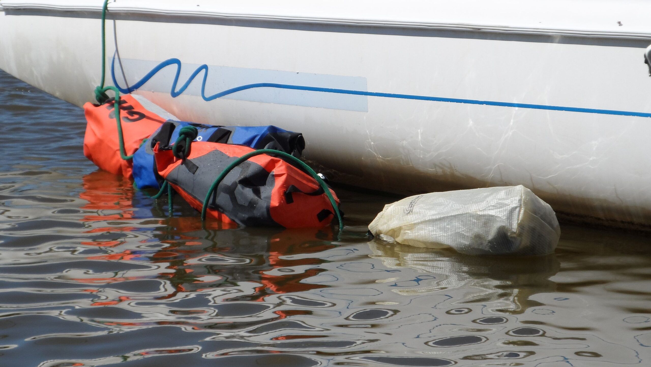 We tested drybags by tying them in strings and towing them for hours. No failures. (Photo/ Drew Frye)
