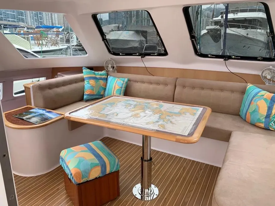 The older builds of the 1160 still feature the light-filled interior, but the finishings and upholstery are dated. Photo courtesy of YachtWorld.com