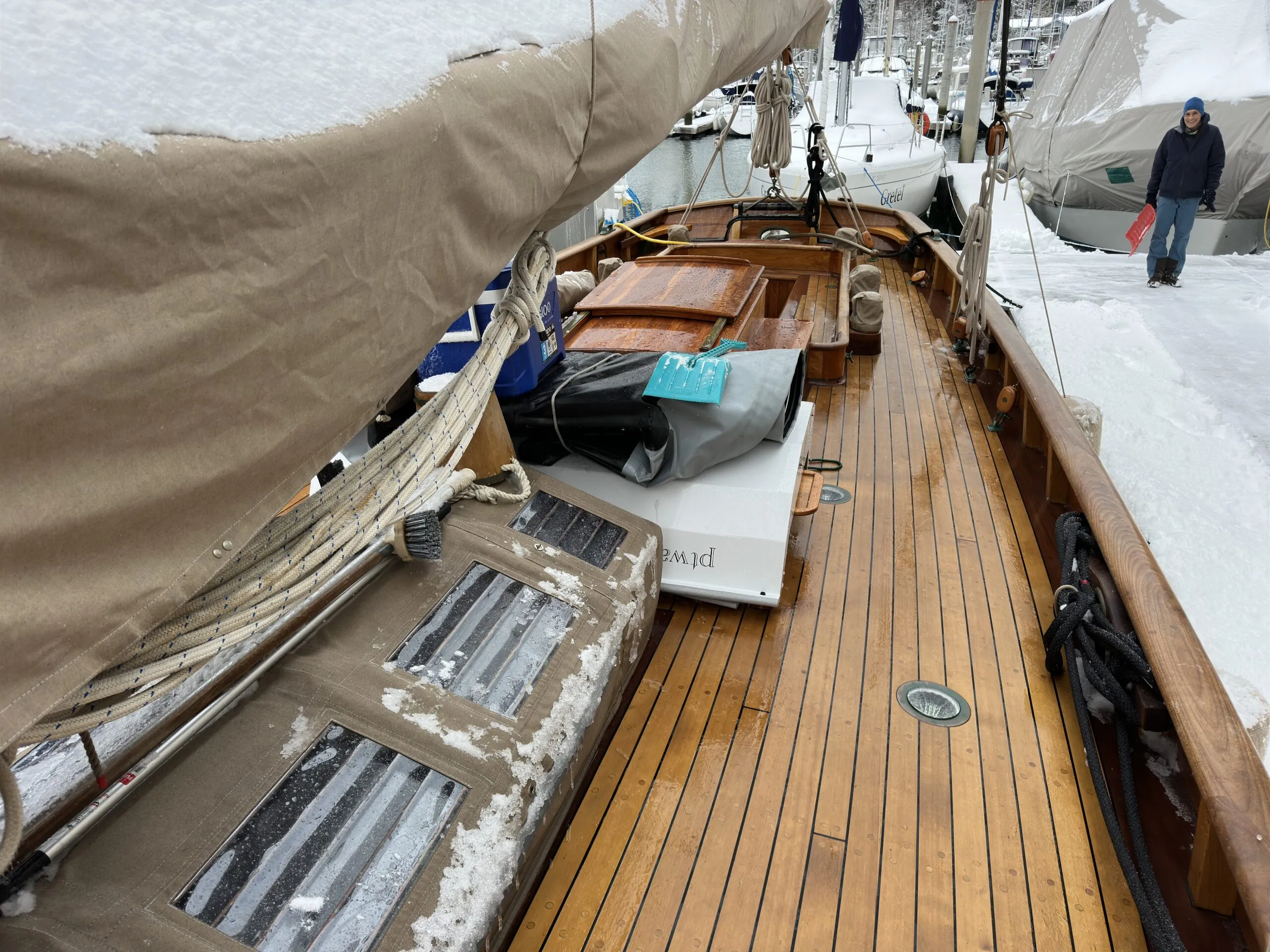 Captured during the rare Pacific Northwest snow, the side decks are unobstructed, the skylight under protective canvas. Note one of the decklights in the foreground. (Photo/ Bert Vermeer)
