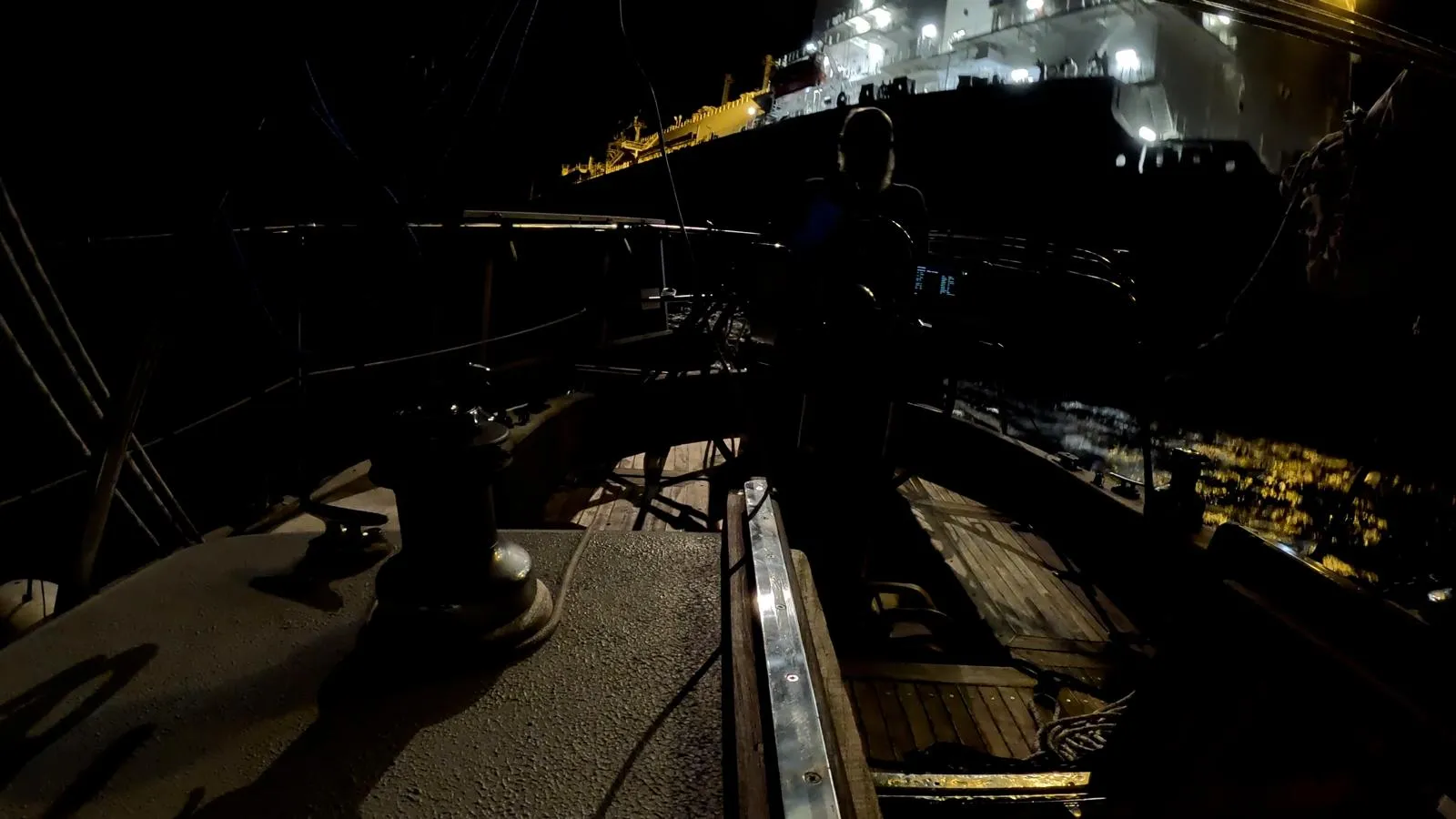 The LNG vessel was alongside Quiet for several hours in the darkness of night using a crane to drop generous amounts of diesel, engine oil and food. It took John four hours to stow all of the supplies. (Photo/ John Jones)