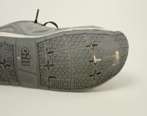 Repair of ripped sole with polyurethane sealant. (Photo/ Drew Frye)