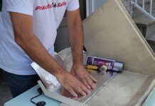 Applying the soundproofing material. (Photo/ Marc Robic)