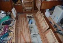 The cabin sole is in place, the bilge hatches with underside exposed showing the strong boxes created to prevent warping. (Photo/ Bert Vermeer)