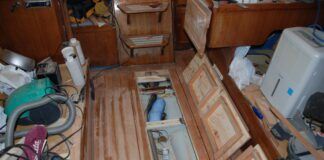 The cabin sole is in place, the bilge hatches with underside exposed showing the strong boxes created to prevent warping. (Photo/ Bert Vermeer)