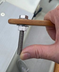 Keep the bolt on the pilot mount end a bit loose (but locked in place with thread-locking fluid) to make raising and lowering the stick over the tiller pin easier. (Photo/ Doug Henschen)