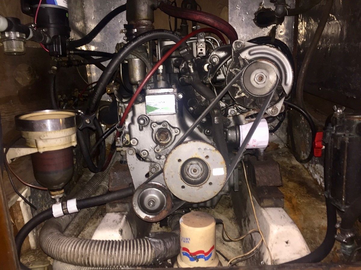 Most surveyed PY26 owners have upgraded from the standard outboard propulsion to an 8-hp Yanmar diesel like this 2GM model, though many report wishing they had opted for 12 horsepower instead. While the inboard installation provides convenience, owners note the engine can be loud and somewhat underpowered, managing 5.5 knots in calm conditions but slowing to 3-4 knots in choppy seas. Courtesy of Yatco.com