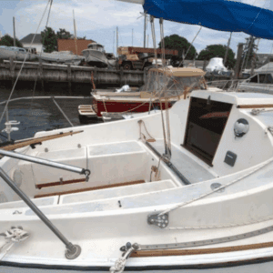 The PY26's cockpit shows John Deknatel's signature high coaming design that extends into the cabin on either side of the companionway—a feature he also used on his O'Day designs. This provides great back support for the crew, and keeps spray contained on deck. Courtesy of Sailboat.guide