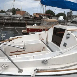 The PY26's cockpit shows John Deknatel's signature high coaming design that extends into the cabin on either side of the companionway—a feature he also used on his O'Day designs. This provides great back support for the crew, and keeps spray contained on deck. Courtesy of Sailboat.guide