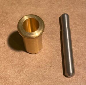 Using an already installed pilot socket and tiller pin, rather than a commercial tiller lock, is a more streamlined solution. (Photo/ Doug Henschen)