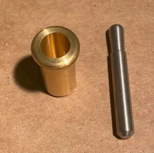 Using an already installed pilot socket and tiller pin, rather than a commercial tiller lock, is a more streamlined solution. (Photo/ Doug Henschen)