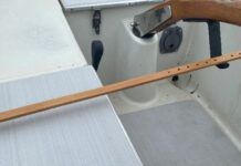 This simple home-grown device offers a choice of rudder positions and takes advantage of the mounting socket and tiller pin already set up for a Raymarine Tiller Pilot. (Photo/ Doug Henschen)