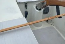 This simple home-grown device offers a choice of rudder positions and takes advantage of the mounting socket and tiller pin already set up for a Raymarine Tiller Pilot. (Photo/ Doug Henschen)