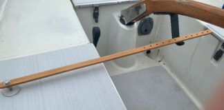 This simple home-grown device offers a choice of rudder positions and takes advantage of the mounting socket and tiller pin already set up for a Raymarine Tiller Pilot. (Photo/ Doug Henschen)