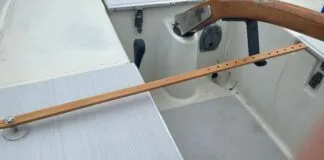This simple home-grown device offers a choice of rudder positions and takes advantage of the mounting socket and tiller pin already set up for a Raymarine Tiller Pilot. (Photo/ Doug Henschen)