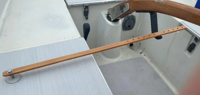 This simple home-grown device offers a choice of rudder positions and takes advantage of the mounting socket and tiller pin already set up for a Raymarine Tiller Pilot. (Photo/ Doug Henschen)