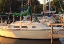 The PY26's classic 1970s lines display designer C. Raymond Hunt's skill at balancing proportions for this popular family cruiser. The conservative rake of the stem and nearly vertical reverse transom help maximize interior space while still stylish alongside more modern cruisers. Courtesy of SailboatListings.com