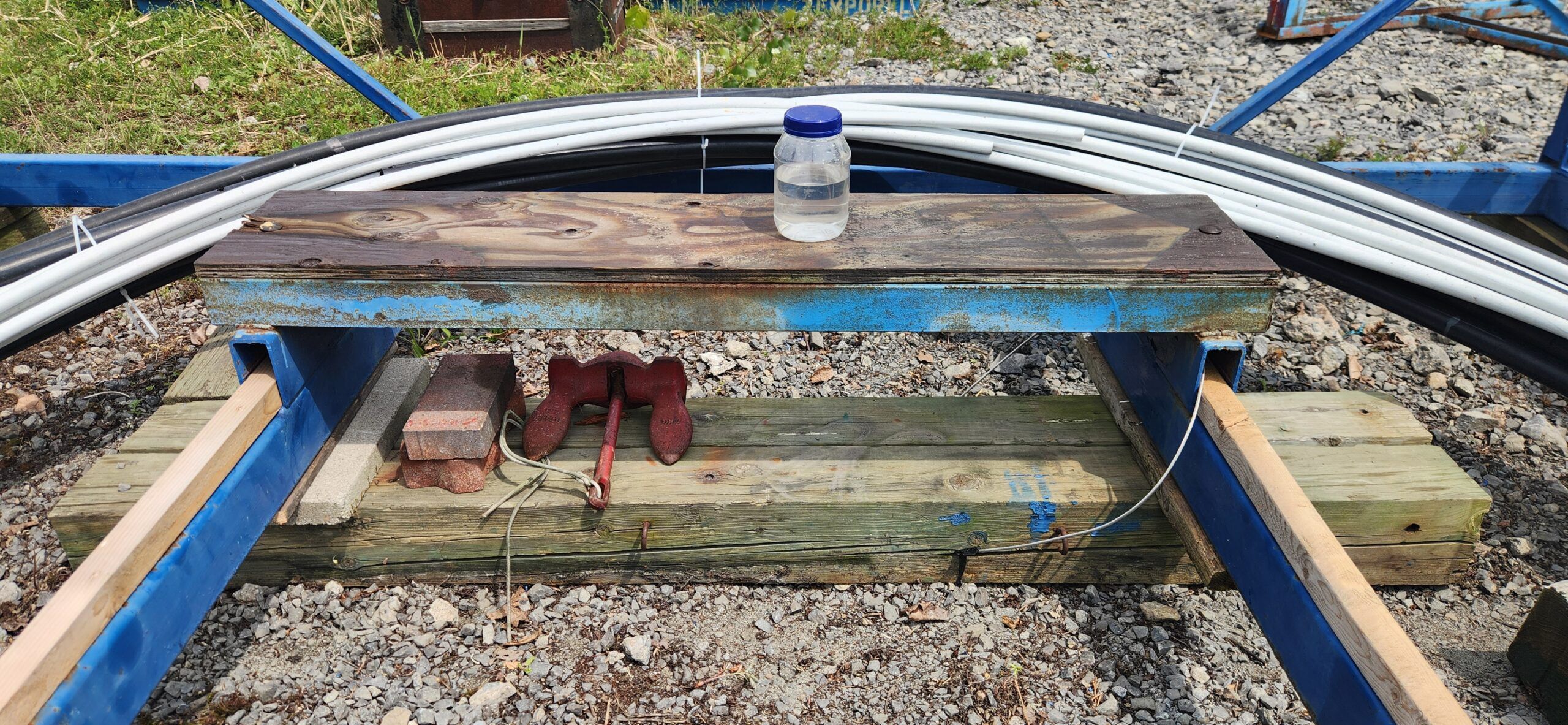 A clear plastic bottle or glass with water is a great makeshift level gauge. (Photo/ Marc Robic)