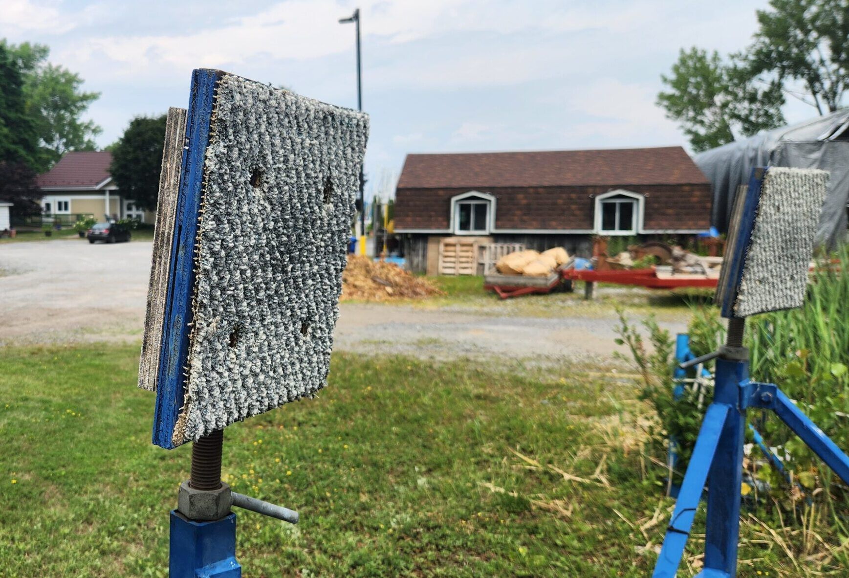 Adjustable pads with handle welded onto the adjusting bolt. A new outdoor welcome mat was cutting into squares to use as pad protectors. Pads themselves are made of marine grade 3/4” plywood. (Photo/ Marc Robic)