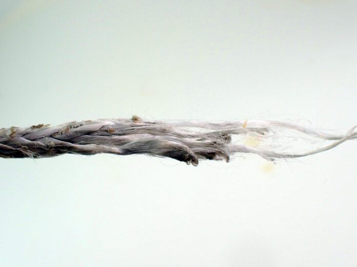 On the failed Dyneema whisker stay, the melting is more severe near the failure point. As the sheet reached a stable point more force and motion was concentrated in a smaller area. (Photo/ Drew Frye)