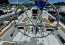 The 36.7's cockpit emphasizes racing functionality with its large stainless steel wheel and full-beam mainsheet traveler. The convertible cockpit seats can be shortened by 20 inches to create more working space for sail trimmers in racing mode. Courtesy of YachtWorld.com