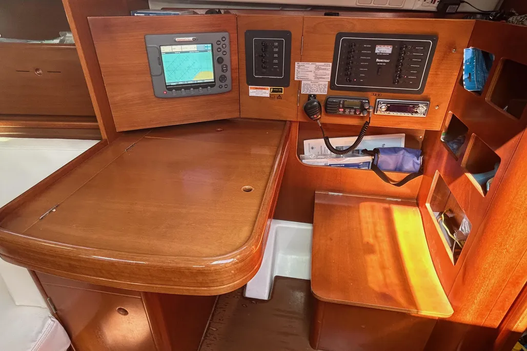 The 31-in. by 23-in. chart table accommodates folded charts, while storage drawers and shelved compartments below provide organized space for navigational gear and instruments. The well-organized skipper will find adequate room for necessary gadgetry, though with little space left over. Courtesy of Yachtworld.com