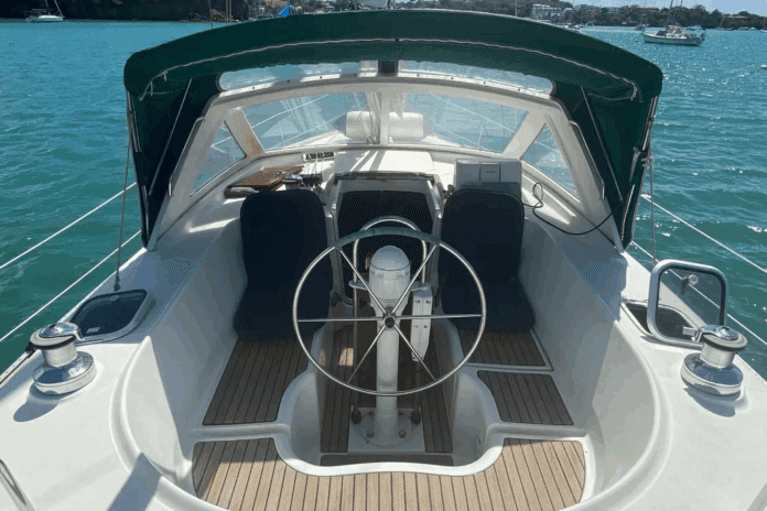 Beneteau Oceanis 36 CC-Cockpit The center cockpit layout places the helmsperson high above the waterline, offering excellent visibility during anchoring and maneuvering. The cockpit's compact size—seating only three in real comfort—reflects her offshore cruising priorities over entertaining. Courtesy of Yachtworld.com
