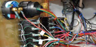 The wiring behind the install is now properly connected and labeled, in contrast to the rat's nest encountered after purchasing the boat. (Photo/ Bert Vermeer)