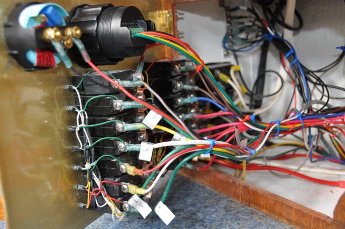 The wiring behind the install is now properly connected and labeled, in contrast to the rat's nest encountered after purchasing the boat. (Photo/ Bert Vermeer)