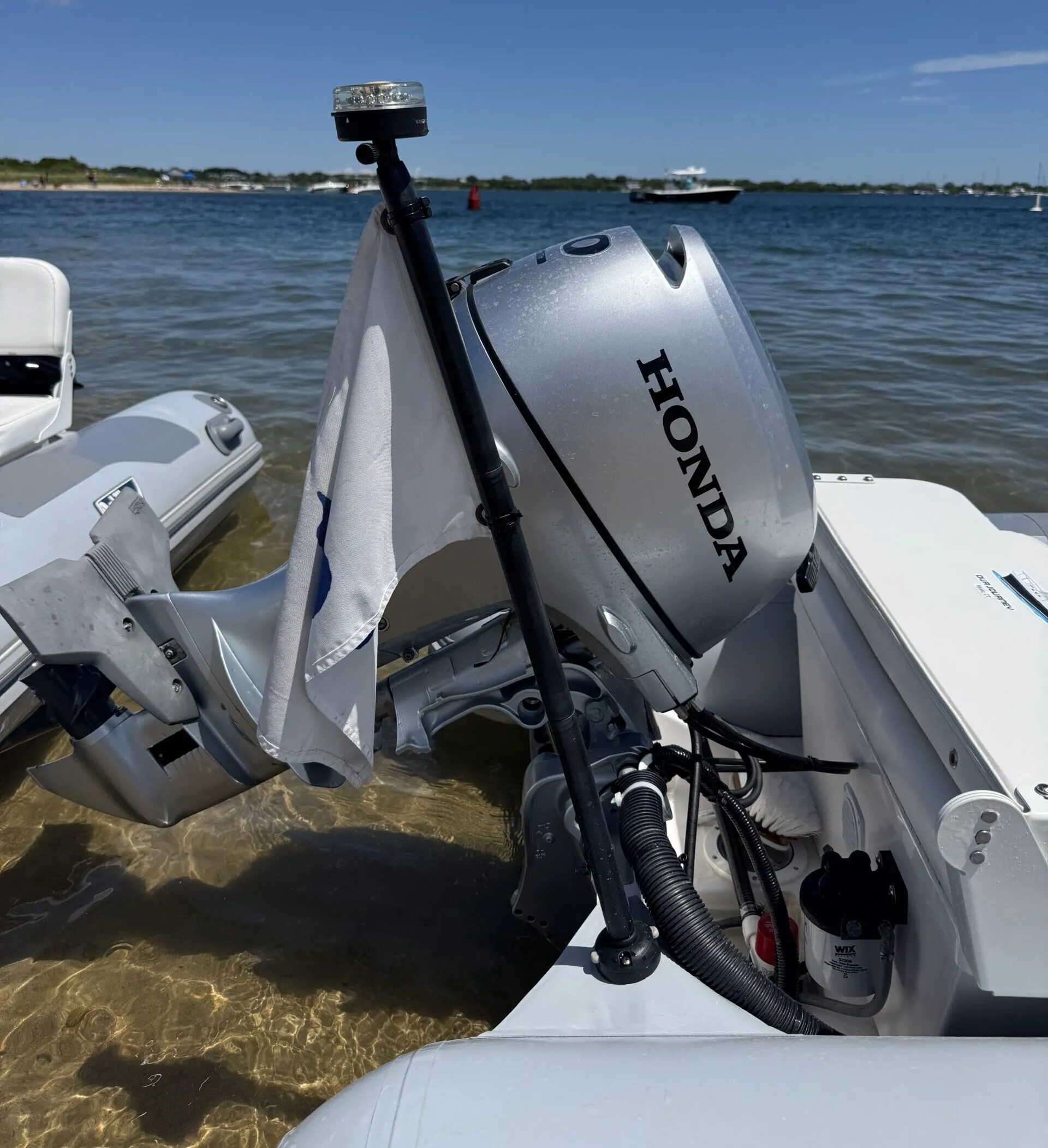 Navisafe light mounted on dinghy stern for reliable, USCG-approved lighting. (Photo/ Todd Vorenkamp)