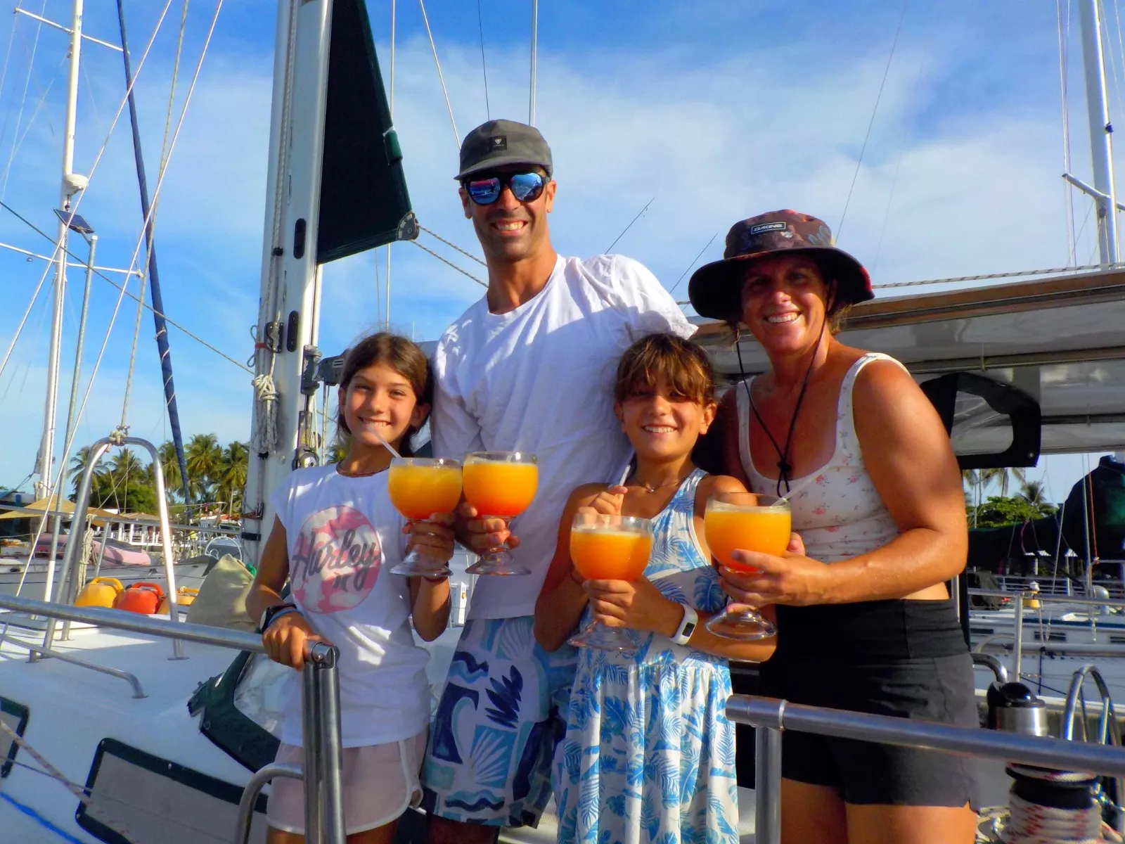 S/V Way She Goes 11 arriving into Bahia del Sol and enjoying their welcome beverage. David Gagne and Marie Robert, with their children Maelle and Olivia.