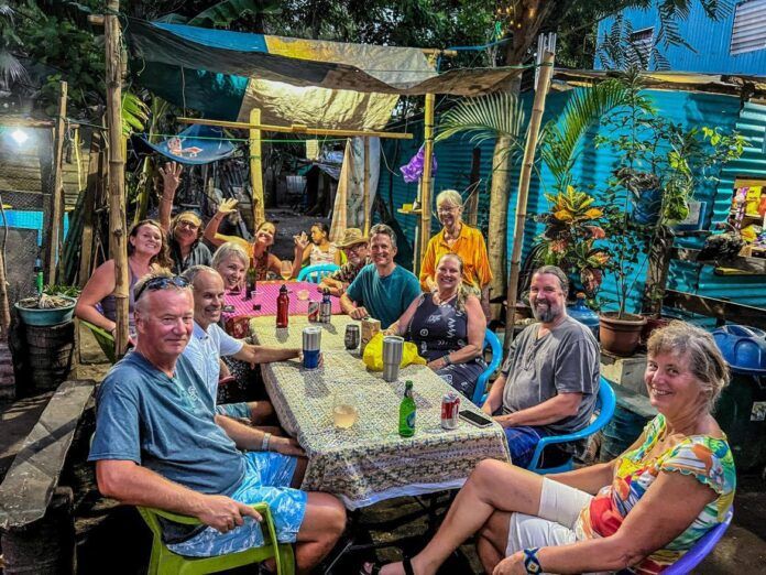 pupusa night (1) Traditional Pupusa Night at Bill and Jean's. Pupusas are the El Salvadoran national food and can be found in all flavors and sizes on street corners and eating establishments throughout the country. The pupusa shell is a hand-sized small pizza filled with a multitude of local foods including beans, cheese, fish, beef and many more exciting tastes. (Photo/ Pamela Bendall)