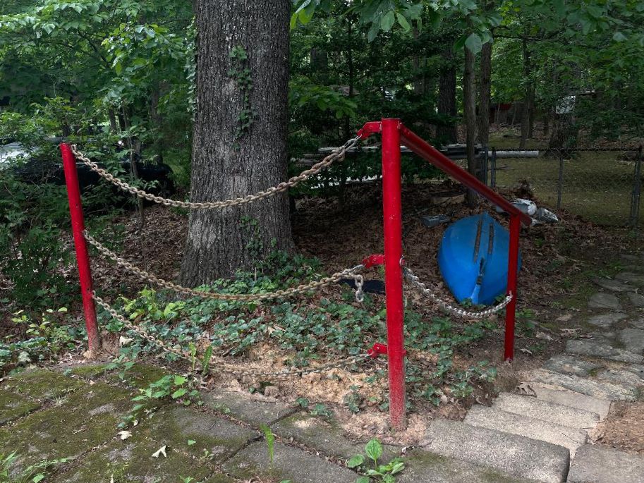 Anchor chain as railing. The posts are from my childhood swing set. A great example of how to recycle old parts into something useful. (Photo/ Drew Frye)