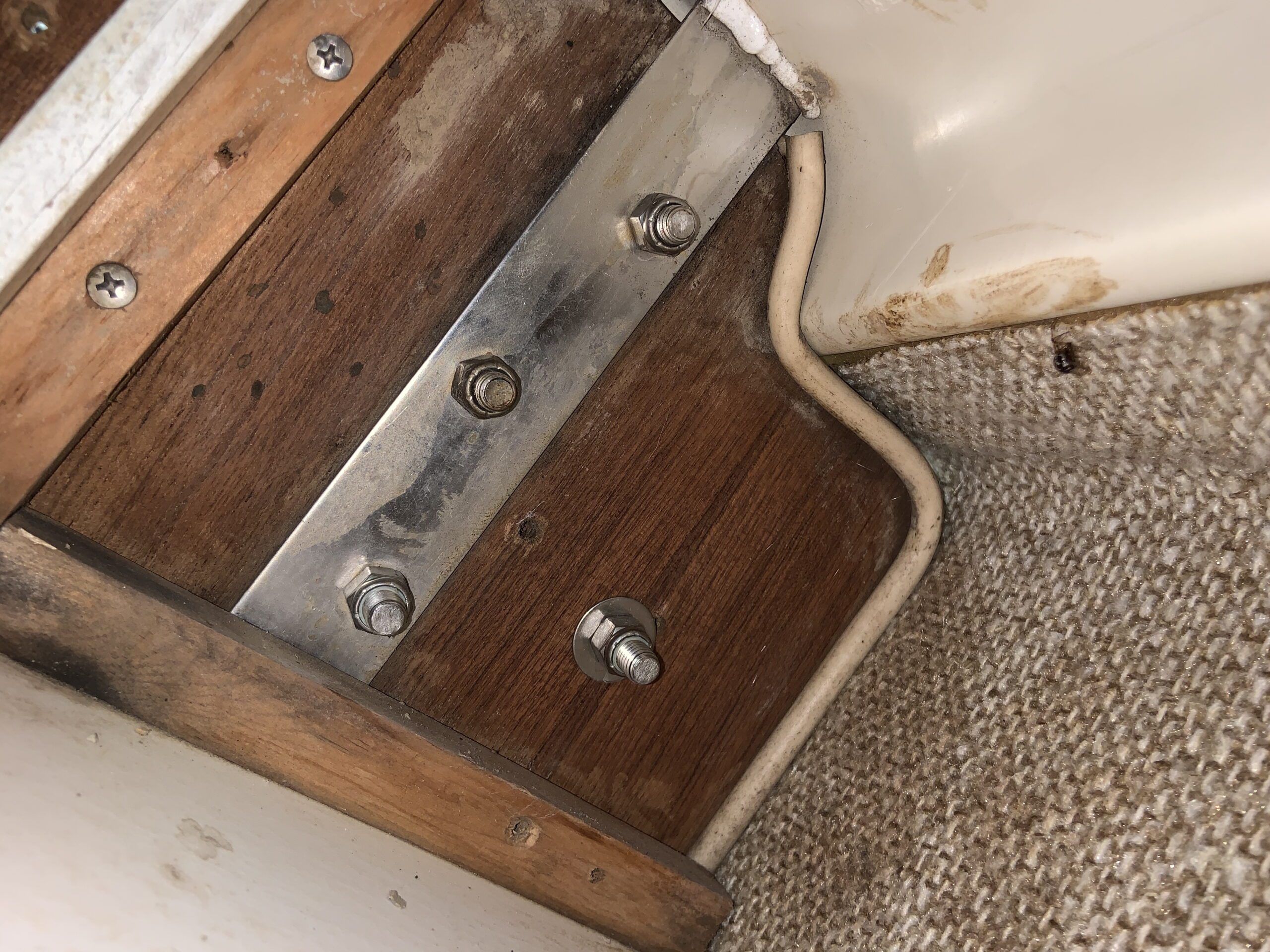 Original port chainplate before removal. (Photo/ Steve Milan)