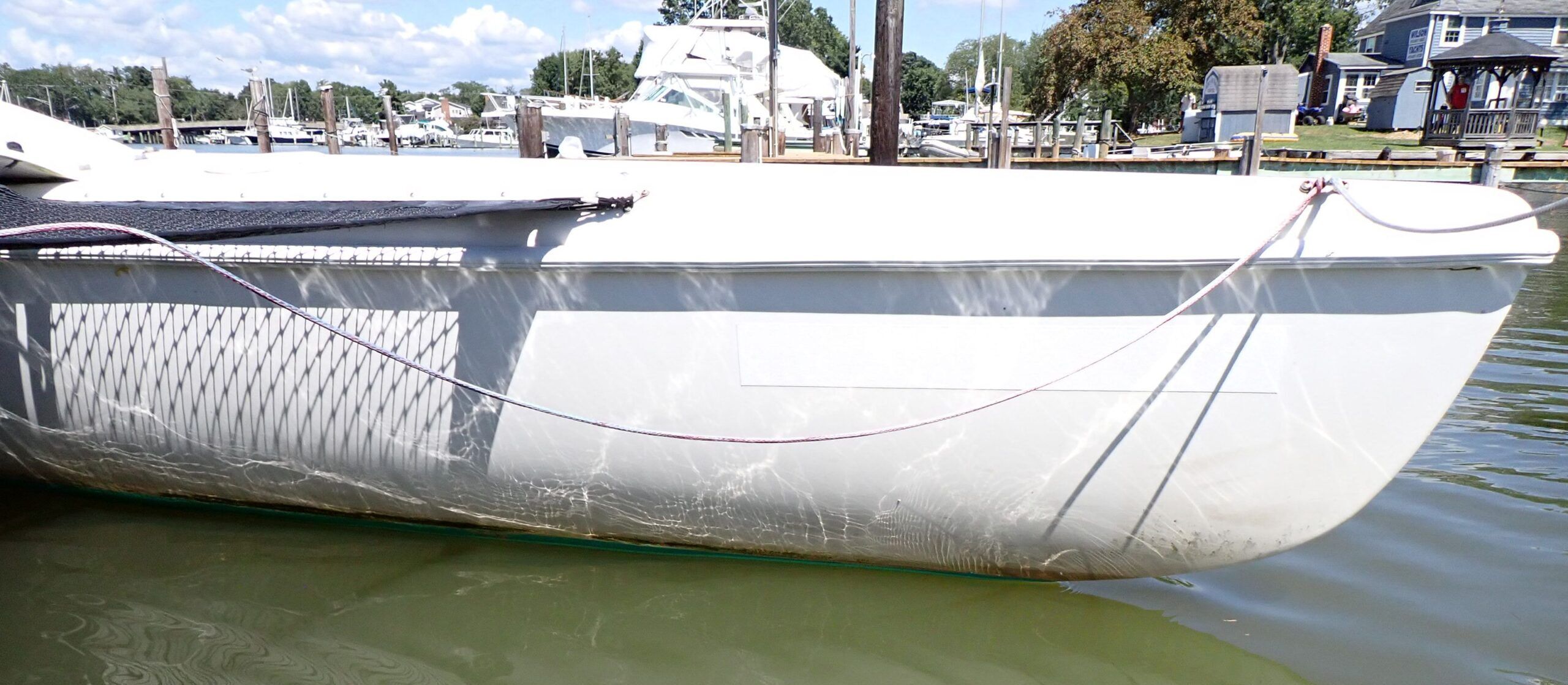 The ama is clean. The only growth is above the antifouling. (Photo/ Drew Frye)