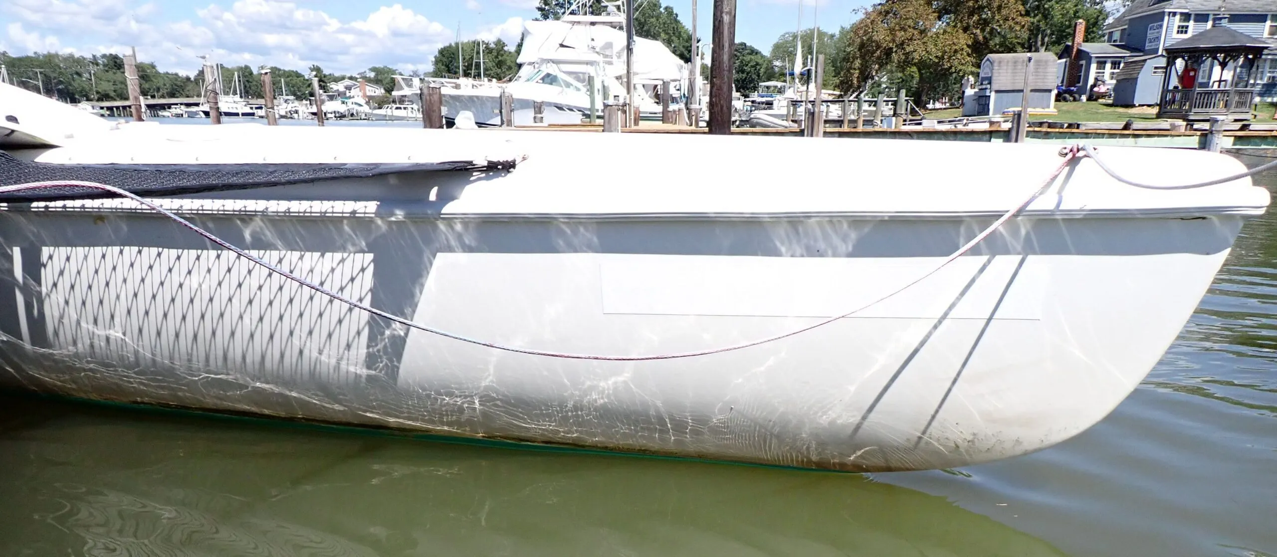 The ama is clean. The only growth is above the antifouling. (Photo/ Drew Frye)