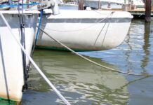 Krypton paint worn away on the bow at the waterline. On the plus side, this means there will be no build up that will need to be sanded off. Next time, we’ll give this area a few more coats. (Photo/ Drew Frye)